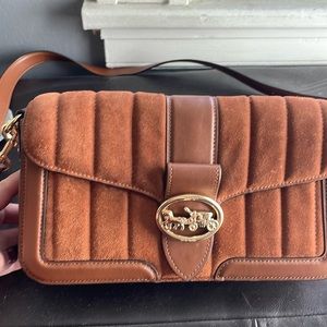 Coach leather and suede golden brown crossbody and shoulder bag.